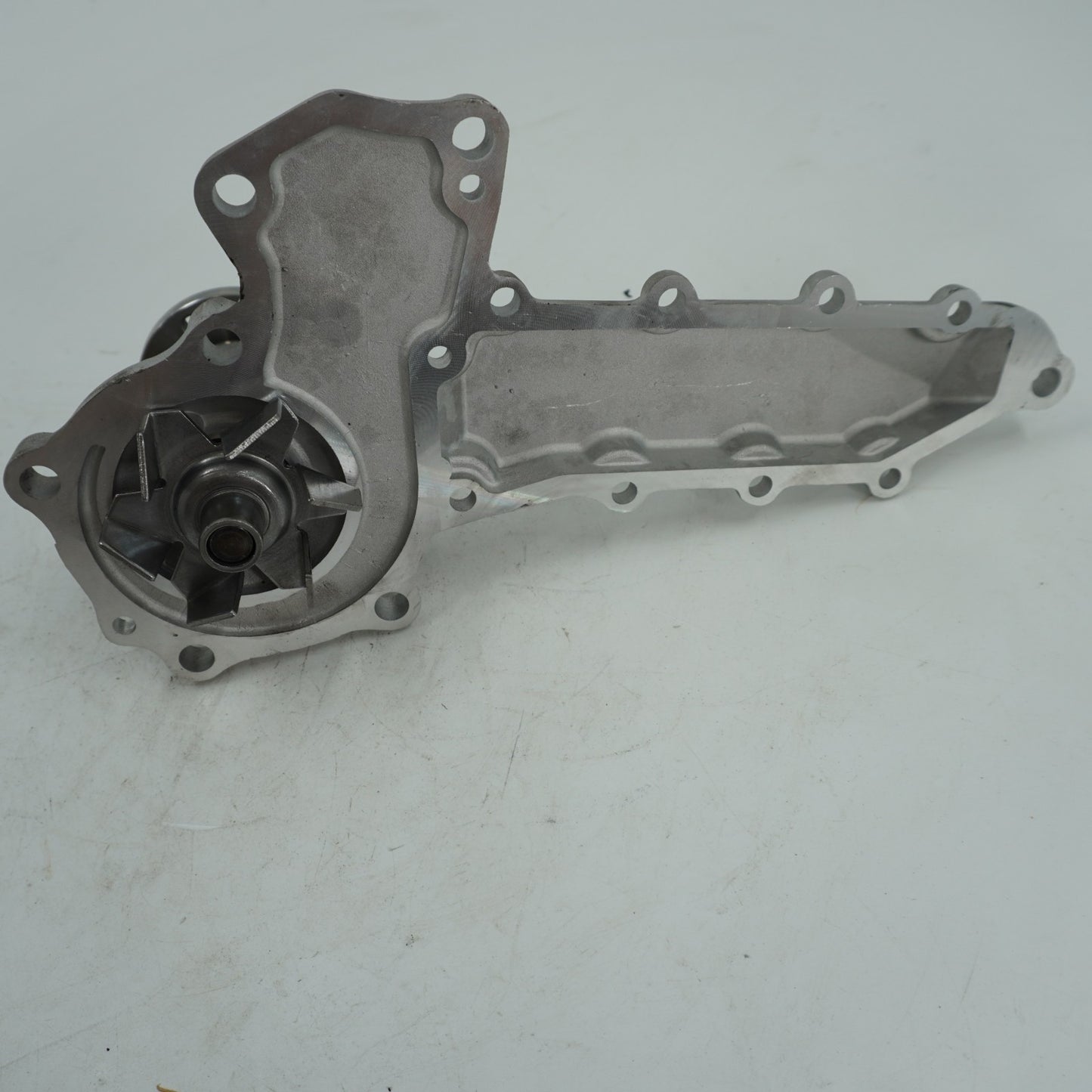 Engine Water Pump 15521-73030 For Kubota V1902 V2203 Tractor Part