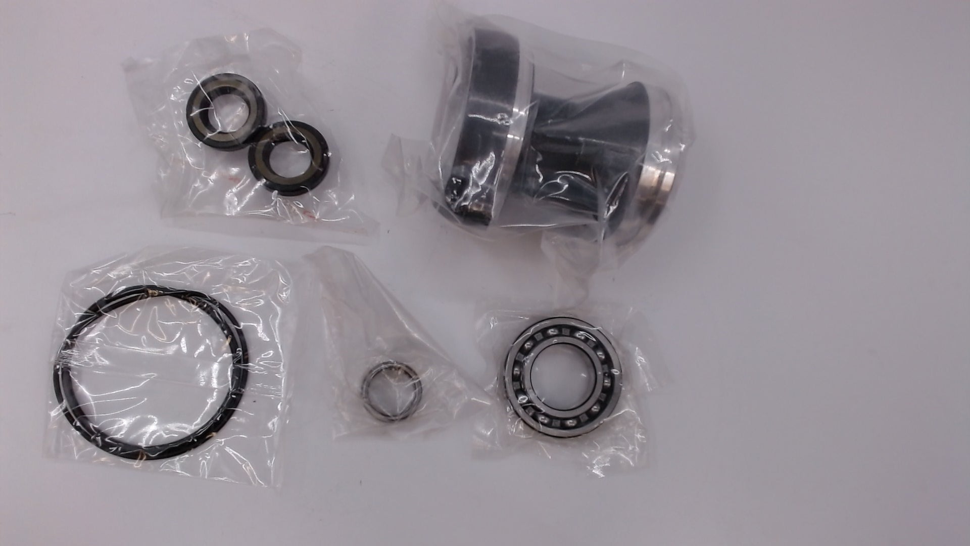 LOWER CASING CAP WITH BEARING ASSEMBLY