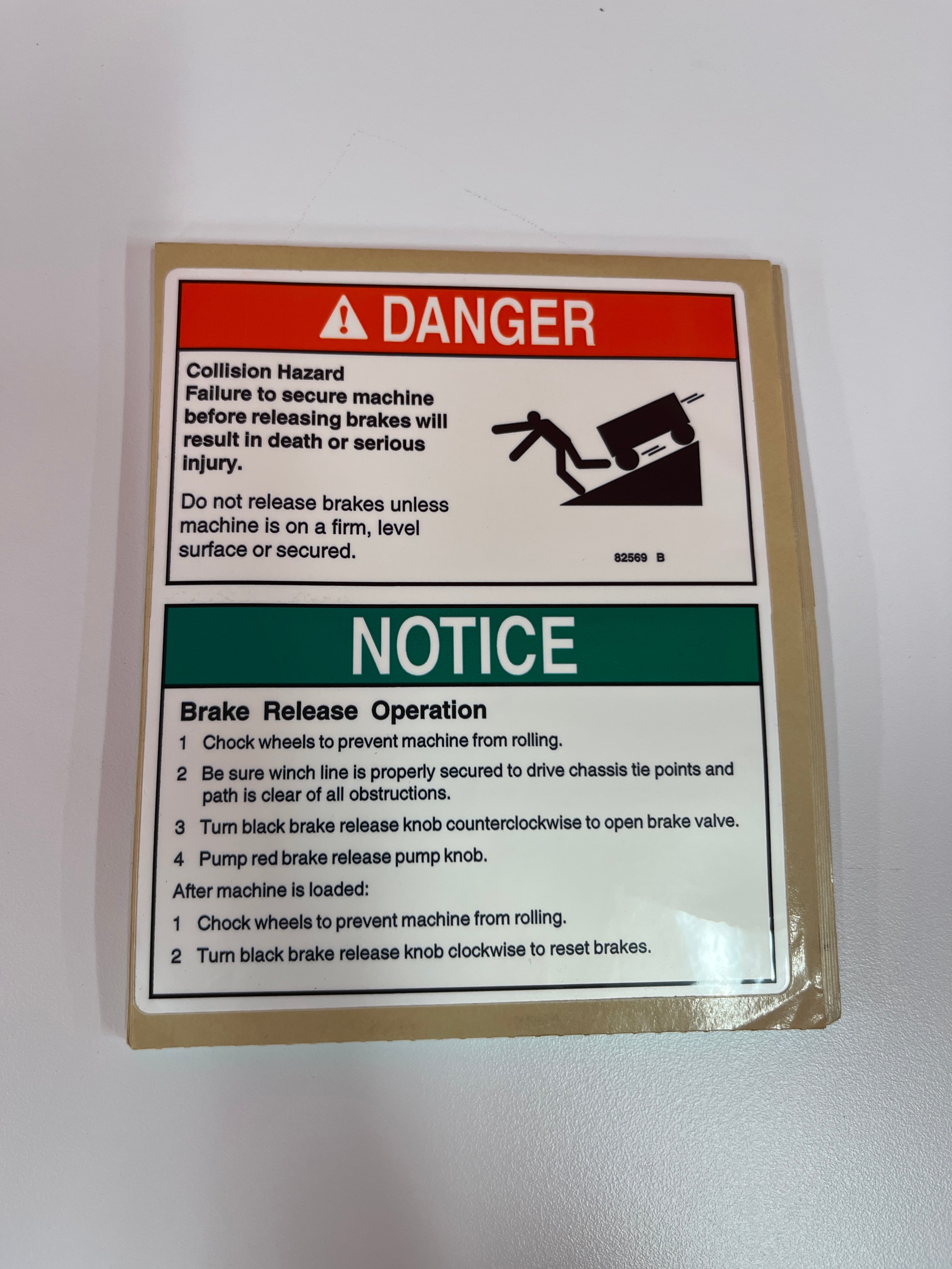 DECAL, DANGER, BRAKE REL SAFETY