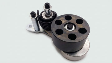 BELT TENSIONER ASSEMBLY